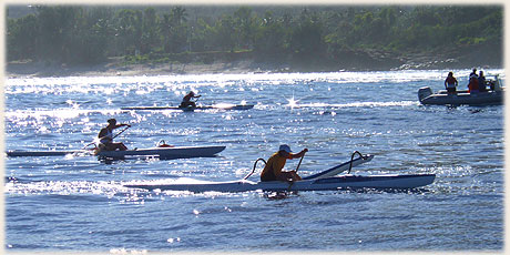 women paddlers at 07:30 am during start of Round Raro OC1 Relay Race / Photo by Archi © sokalavillas.com